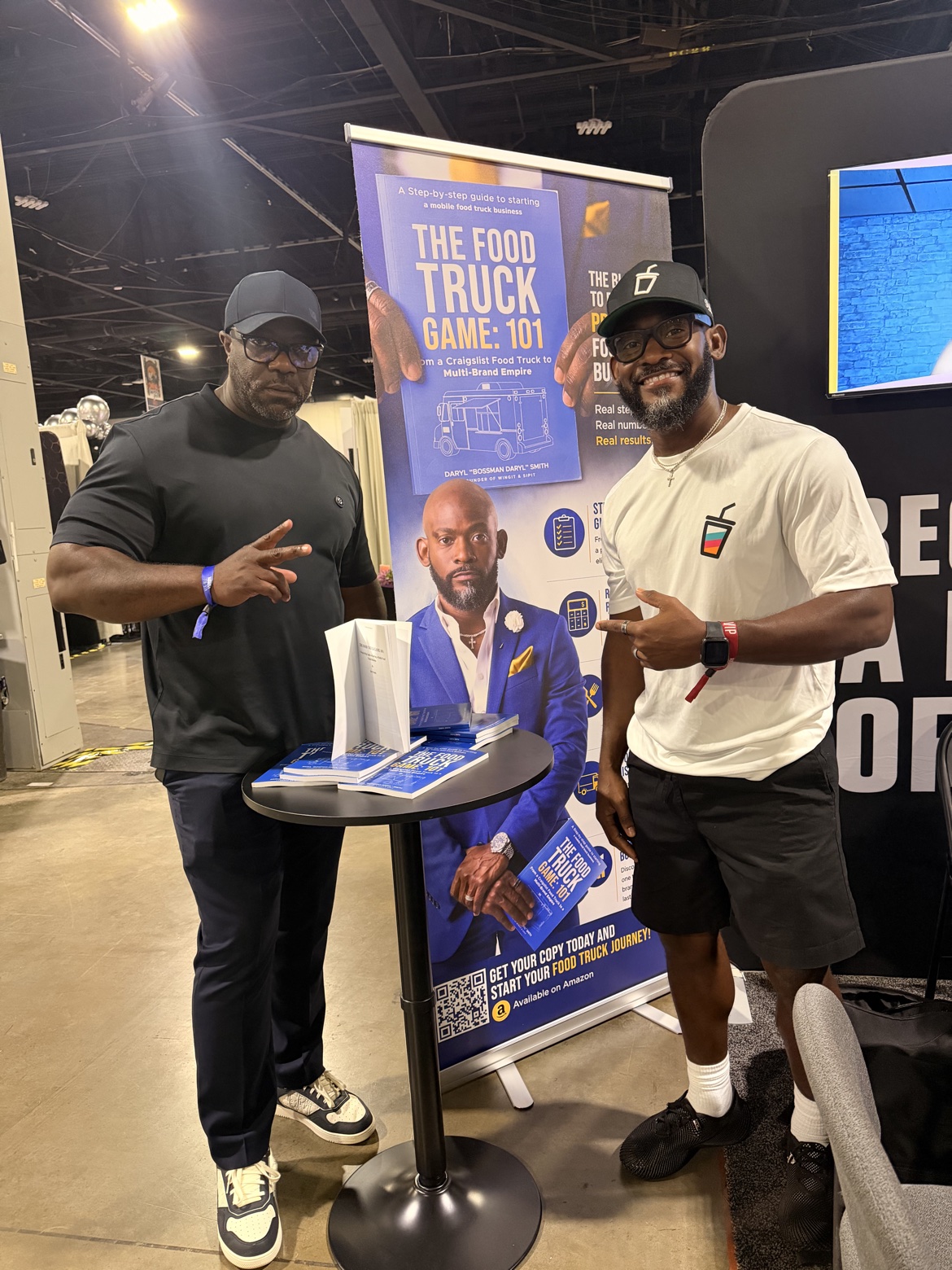 Bossman Daryl with readers at his book expo booth