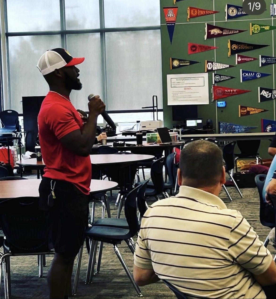 Bossman Daryl speaking to students at a school