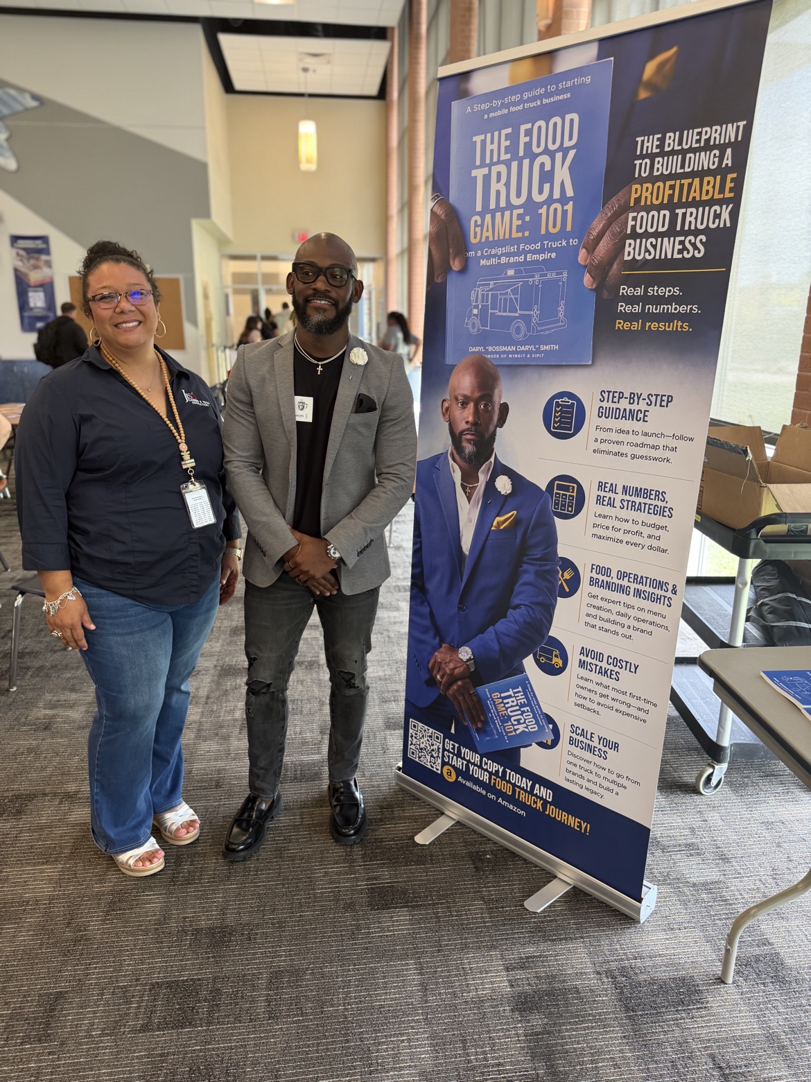 Bossman Daryl with a reader at a book event