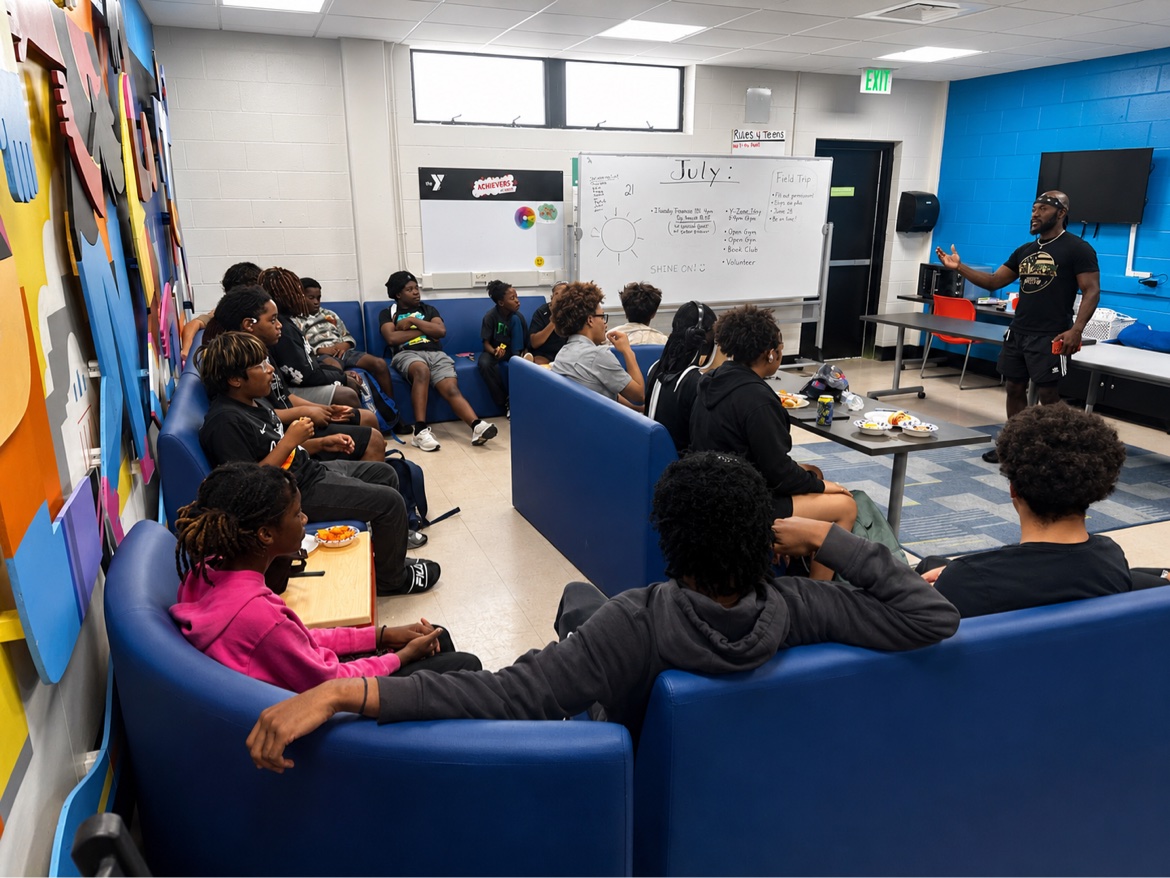 Bossman Daryl speaking to teens at the YMCA